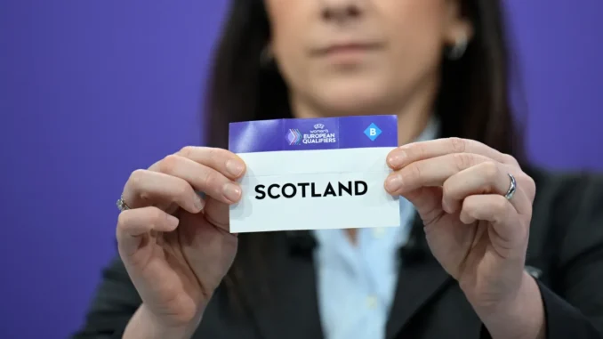 NYON, SWITZERLAND - MARCH 5: UEFA Managing Director of Women's Football Nadine Kessler draws out the card of Scotland during the UEFA Women's EURO 2025 Qualifying Round Draw at the UEFA Headquarters, The House of the European Football, on March 5, 2024 in Nyon, Switzerland.