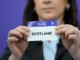 NYON, SWITZERLAND - MARCH 5: UEFA Managing Director of Women's Football Nadine Kessler draws out the card of Scotland during the UEFA Women's EURO 2025 Qualifying Round Draw at the UEFA Headquarters, The House of the European Football, on March 5, 2024 in Nyon, Switzerland.