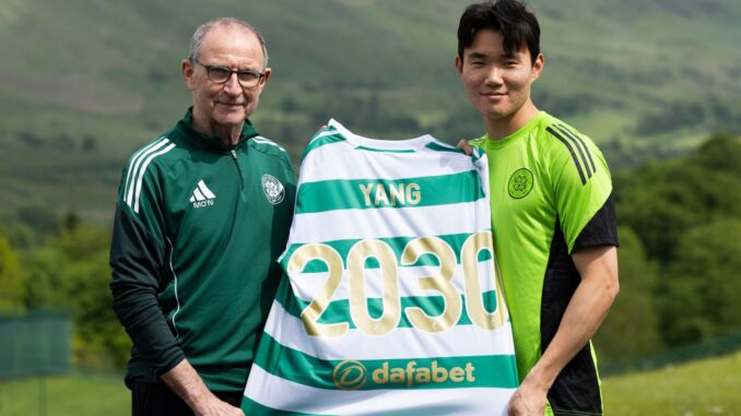 Celtic FC winger Yang with manager Martin O'Neill after the forward signed a contract until 2030.